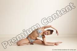 Swimsuit Gymnastic poses Woman White Moving poses Slim long brown Dynamic poses Academic